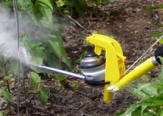 Gotcha Sprayer Pro dusting for garden pests